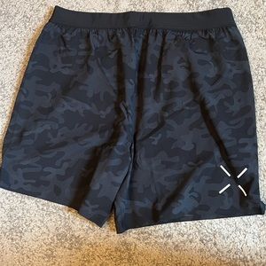 Ten thousand interval shorts XL with liner. 7 inch inseam.